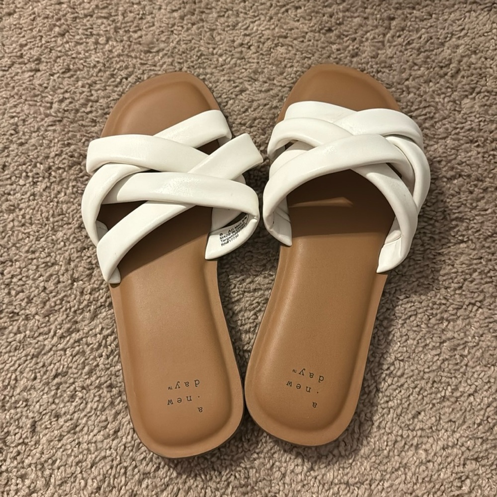White strappy slip on sandals